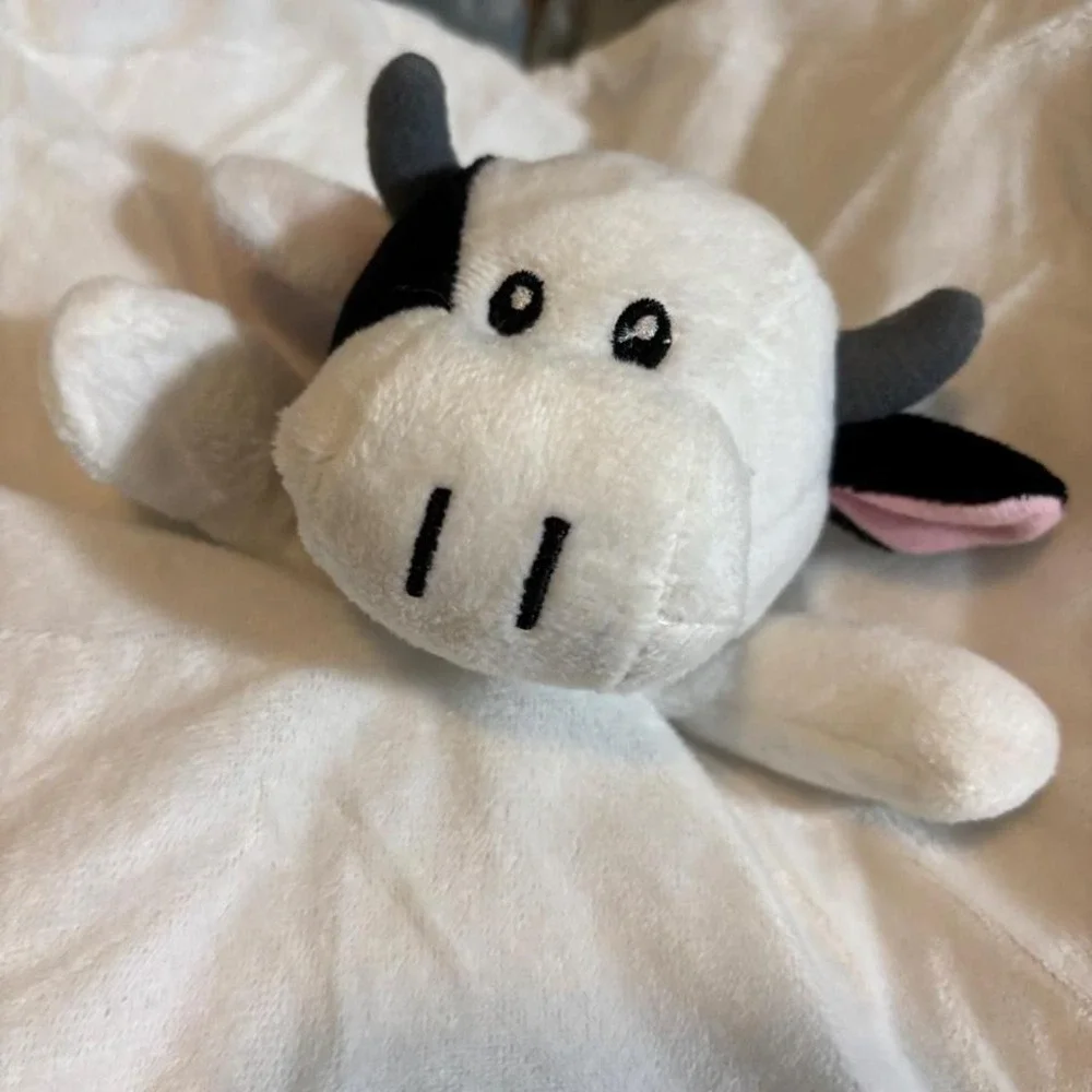 Baberoo white and gray cow plush lovey with black spots